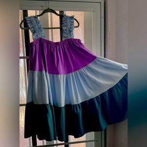 Beautiful swing mini dress. Great colors. Lightly used.